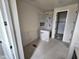 Bathroom featuring a stand up shower, granite counters, tiled floors, and a walk in closet at 24183 N 196Th Ln, Surprise, AZ 85387
