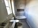 Bathroom features a tiled shower and tub combination, granite counters and a window at 24183 N 196Th Ln, Surprise, AZ 85387
