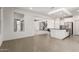Bright eat-in kitchen features an island with granite countertops and stainless steel appliances at 24733 N 96Th Ln, Peoria, AZ 85383