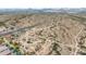 Expansive aerial view of a desert landscape with roads and residential area in the distance at 26633 N 41St Way, Cave Creek, AZ 85331