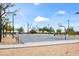 Community basketball court with hoops and smooth surface, bordered by desert landscaping and lighting at 26633 N 41St Way, Cave Creek, AZ 85331
