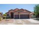 Charming single Gathering home with well maintained landscaping, a three car garage and mature trees at 26633 N 41St Way, Cave Creek, AZ 85331