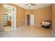 Open main bedroom with en-suite bath and doors to the backyard at 26633 N 41St Way, Cave Creek, AZ 85331