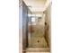 Modern tile shower featuring a glass enclosure and a sleek, handheld shower head at 26633 N 41St Way, Cave Creek, AZ 85331