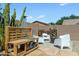 Outdoor area with wood storage, BBQ prep station, and additional seating at 30031 N Little Leaf Dr, San Tan Valley, AZ 85143