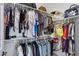 Walk-in closet with built-in shelving and clothing racks for optimal storage at 30031 N Little Leaf Dr, San Tan Valley, AZ 85143
