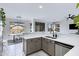Bright and modern kitchen with stainless steel dishwasher, sink and bar top seating at 30031 N Little Leaf Dr, San Tan Valley, AZ 85143
