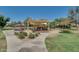 Outdoor play area features shaded structures, multiple slides, and a fun seesaw at 30031 N Little Leaf Dr, San Tan Valley, AZ 85143