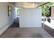 Exterior features an outdoor storage unit with a gray concrete patio in backyard at 303 S Recker Rd # 247, Mesa, AZ 85206