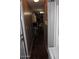 Hallway showing access to the kitchen and laundry area at 303 S Recker Rd # 247, Mesa, AZ 85206