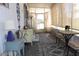 Inviting sun room with vintage furniture and light-filtering curtains at 303 S Recker Rd # 247, Mesa, AZ 85206