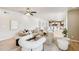 Spacious living room featuring modern decor, an open layout, and tile flooring throughout at 3043 E Hartford Ave, Phoenix, AZ 85032