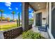 Inviting covered front porch with a stylish bench and tasteful decorations at 306 W Culver St, Phoenix, AZ 85003