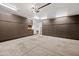 Spacious garage with ample storage, featuring custom cabinets, epoxy floor, and overhead lighting at 306 W Culver St, Phoenix, AZ 85003