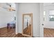 Hallway displaying a mirror and with a dining area visible through the left doorway at 306 W Culver St, Phoenix, AZ 85003