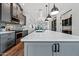 Open kitchen showcasing a large island with pendant lighting and modern appliances at 306 W Culver St, Phoenix, AZ 85003