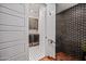 Convenient laundry room featuring modern machines and stylish black and white patterned floors at 306 W Culver St, Phoenix, AZ 85003