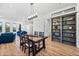 Bright, open living and dining area with hardwood floors and custom built-in shelving at 306 W Culver St, Phoenix, AZ 85003