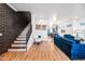 Contemporary living room boasting wood floors, staircase, and stylish decor at 306 W Culver St, Phoenix, AZ 85003