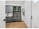 Custom built-in mudroom in neutral color features a bench and storage at 306 W Culver St, Phoenix, AZ 85003