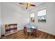 Bright playroom with natural light, featuring a ceiling fan and a table with chairs at 306 W Culver St, Phoenix, AZ 85003