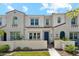 Charming townhome showcasing a stucco facade, gated entry, and well-maintained landscaping at 4077 S Sabrina Dr # 30, Chandler, AZ 85248