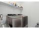 Convenient laundry room featuring modern washer and dryer with ample storage space at 4077 S Sabrina Dr # 30, Chandler, AZ 85248