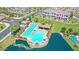 Aerial view of community pool and clubhouse area with cabanas, lounge chairs, and water features at 4077 S Sabrina Dr # 30, Chandler, AZ 85248