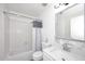Bathroom featuring a shower over tub and a vanity with modern finishes at 4114 E Union Hills Dr # 1088, Phoenix, AZ 85050