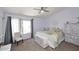 Bright bedroom with neutral tones, a ceiling fan, and comfortable furnishings at 4114 E Union Hills Dr # 1088, Phoenix, AZ 85050