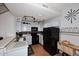 Bright kitchen featuring updated appliances, a breakfast bar, and lots of counter space at 4114 E Union Hills Dr # 1088, Phoenix, AZ 85050