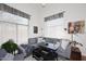Cozy living room with large windows, comfortable seating, and stylish decor, creating an inviting atmosphere at 4114 E Union Hills Dr # 1088, Phoenix, AZ 85050