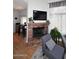Charming living room featuring a fireplace, comfortable seating, and natural light at 4114 E Union Hills Dr # 1088, Phoenix, AZ 85050