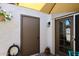 Exterior view of a well maintained patio area with access to storage and a sliding glass door at 4114 E Union Hills Dr # 1088, Phoenix, AZ 85050