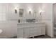 Charming bathroom with double sinks, decorative mirrors, and marble countertop at 4335 E Enrose St, Mesa, AZ 85205