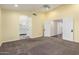Comfortable bedroom featuring carpet, neutral paint, and an attached bath at 4335 E Enrose St, Mesa, AZ 85205