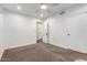 Clean bedroom with white walls, carpeted floor and closet doors at 4335 E Enrose St, Mesa, AZ 85205