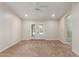 Spacious bedroom with French doors leading to the outdoor space at 4335 E Enrose St, Mesa, AZ 85205
