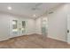 Bright bedroom with a ceiling fan and ensuite bathroom access at 4335 E Enrose St, Mesa, AZ 85205