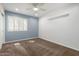 Clean bedroom featuring carpeted floors, neutral walls, and natural light at 4335 E Enrose St, Mesa, AZ 85205