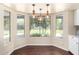 Cozy breakfast nook with bay windows and modern pendant lighting at 4335 E Enrose St, Mesa, AZ 85205