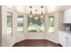 Charming breakfast nook with windows offering abundant natural light and views of the yard at 4335 E Enrose St, Mesa, AZ 85205