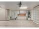 Spacious garage features built-in cabinets and shelving for ample storage at 4335 E Enrose St, Mesa, AZ 85205