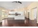 Bright, spacious kitchen with island, modern appliances, white cabinetry, and seamless flow at 4335 E Enrose St, Mesa, AZ 85205
