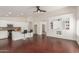 Bright kitchen featuring white cabinets, stainless steel appliances, and a central island at 4335 E Enrose St, Mesa, AZ 85205