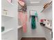 Organized walk-in closet with ample shelving and storage space at 4335 E Enrose St, Mesa, AZ 85205