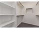 Organized walk-in closet providing ample shelving and rod space at 4335 E Enrose St, Mesa, AZ 85205