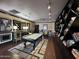 A clubhouse game room featuring a pool table with comfortable seating and art at 4750 N Central Ave # R3, Phoenix, AZ 85012