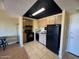 A functional kitchen featuring standard appliances and cabinetry for everyday meal preparation at 4750 N Central Ave # R3, Phoenix, AZ 85012