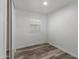 Clean bedroom with vinyl floors, a window with blinds, and ample natural light at 535 S Alma School Rd # 17, Mesa, AZ 85210